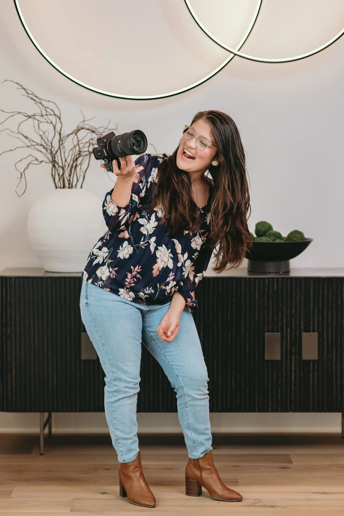 Luisa NC Photography — laughing with her camera in the studio